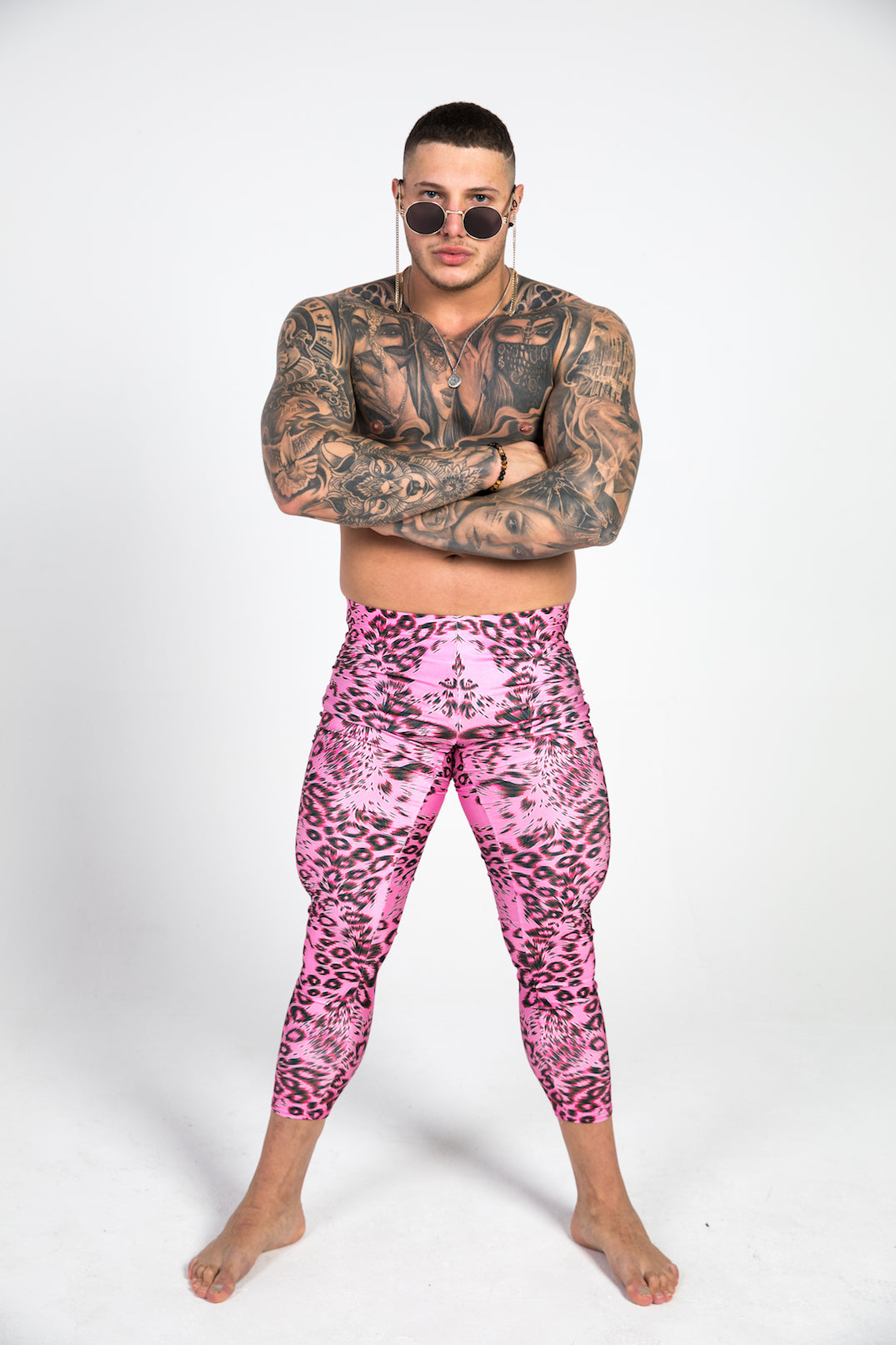 man wearing pink leopard print leggings