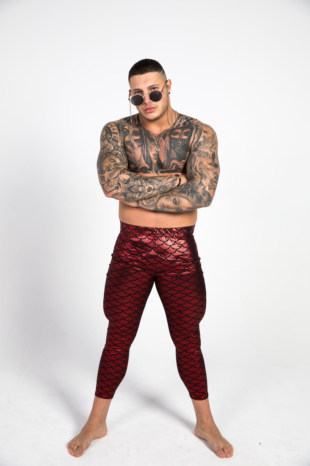 man wearing red fish scale leggings