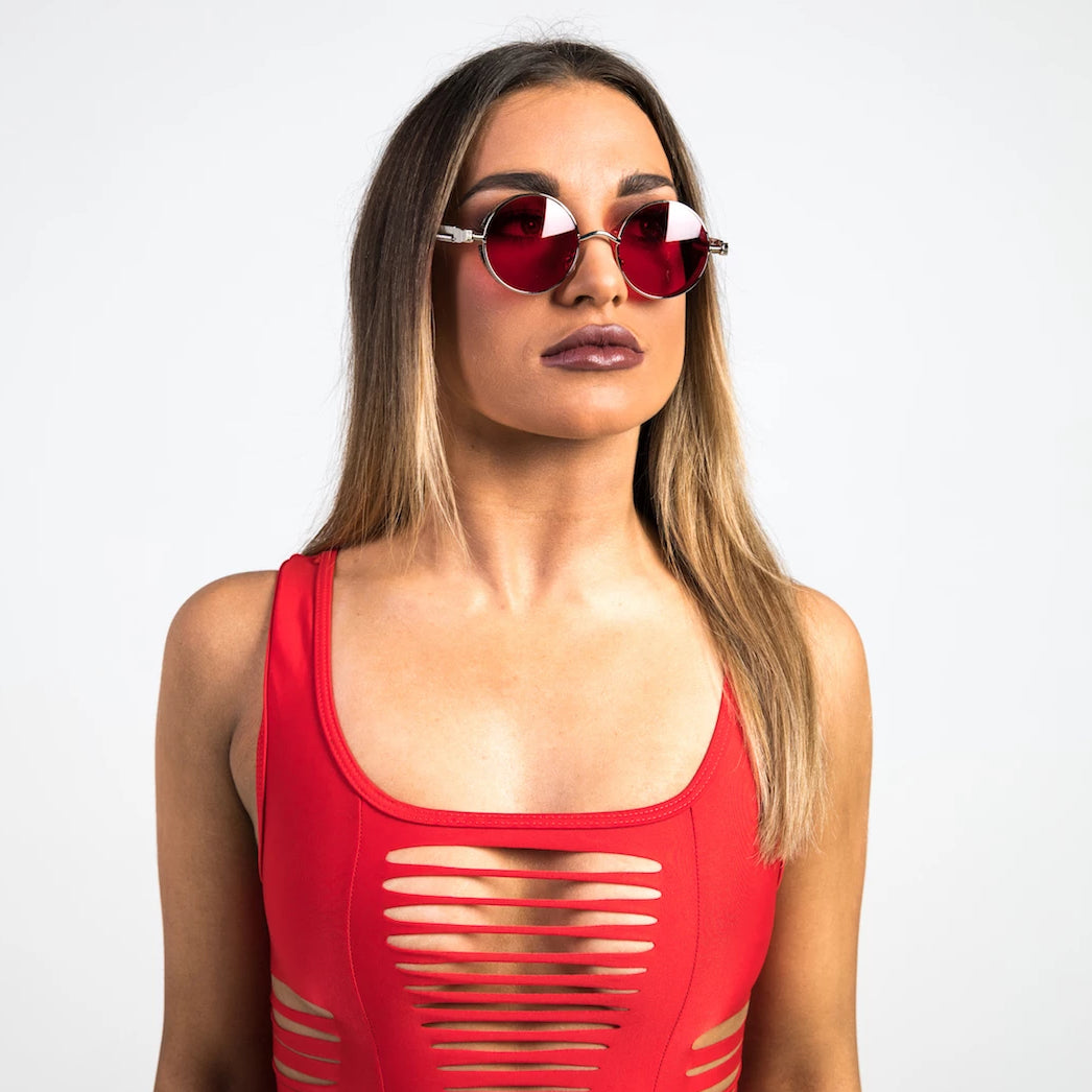 woman wearing red sunglasses
